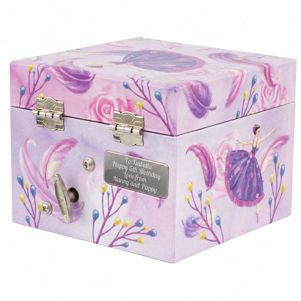 A lavender and pink decorative gift box with butterfly and floral illustrations, silver-tone latches, and a personalized metal plaque on the front, shown on a white background.