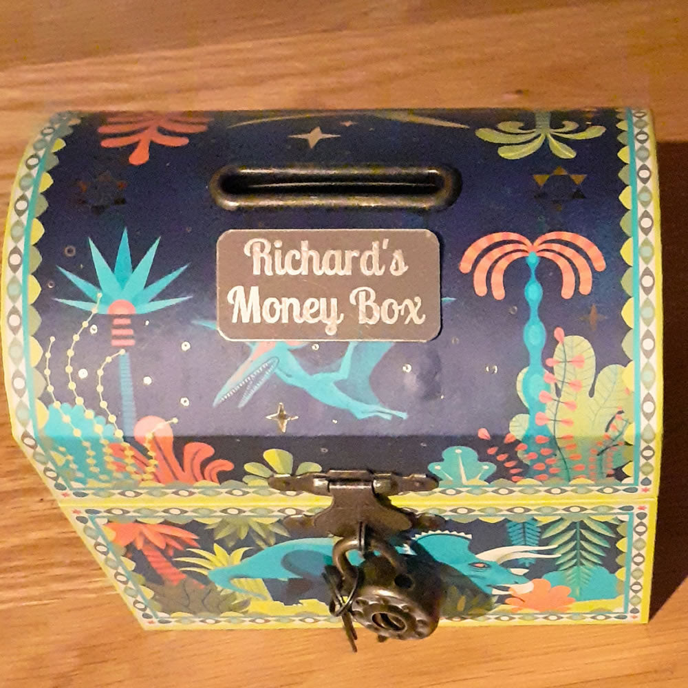 Children’s dinosaur coin bank