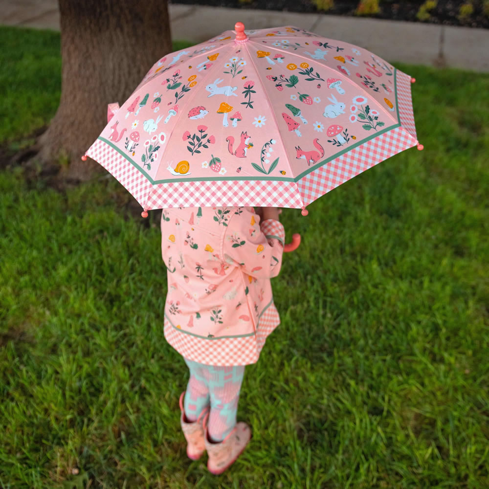 Girl wearing a Strawberry Fields raincoat