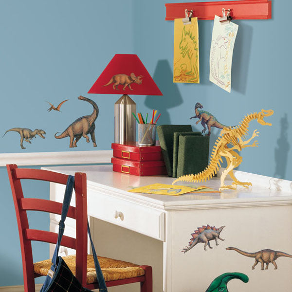 Dinosaur wall decals in a children’s bedroom