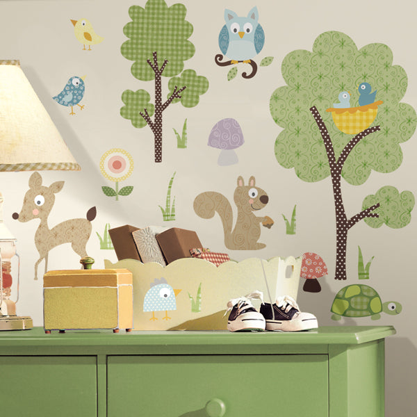 Woodland animal wall decals in a nursery