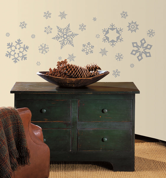 Glitter snowflake wall decals in a children’s room