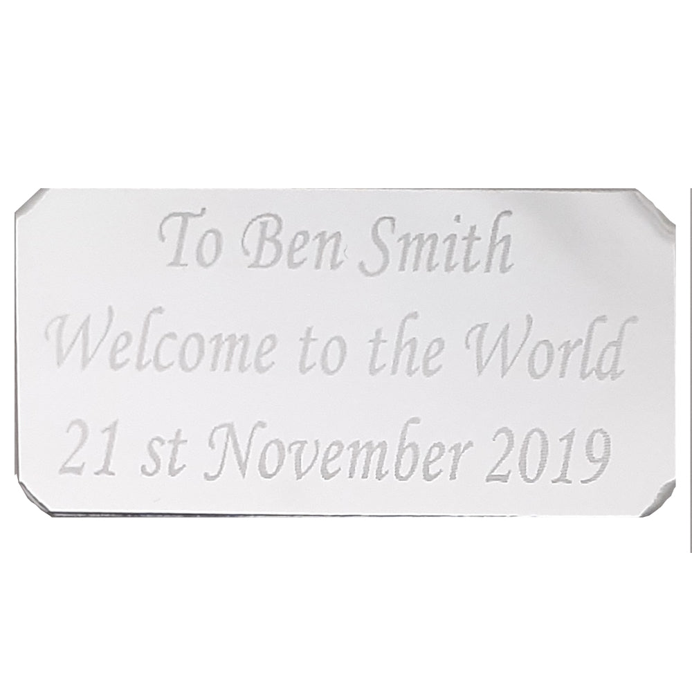 Welcome silver plaque for a bear music box
